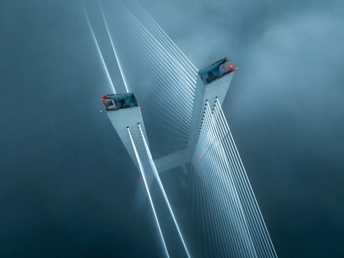 A foggy drone photo of the bridge | Skylum Blog