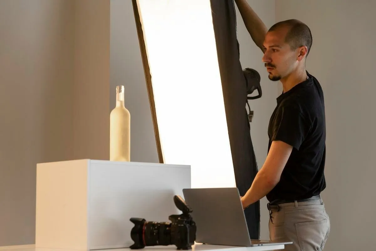 Photographer adjusts lighting for photo | Skylum Blog