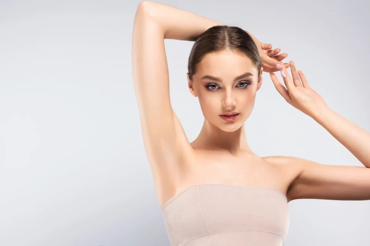 Portrait of a girl with raised hands | Skylum Blog