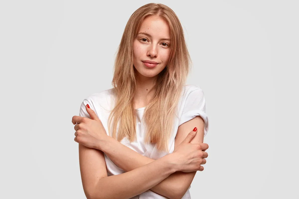 Portrait of a girl with her hands crossed | Skylum Blog