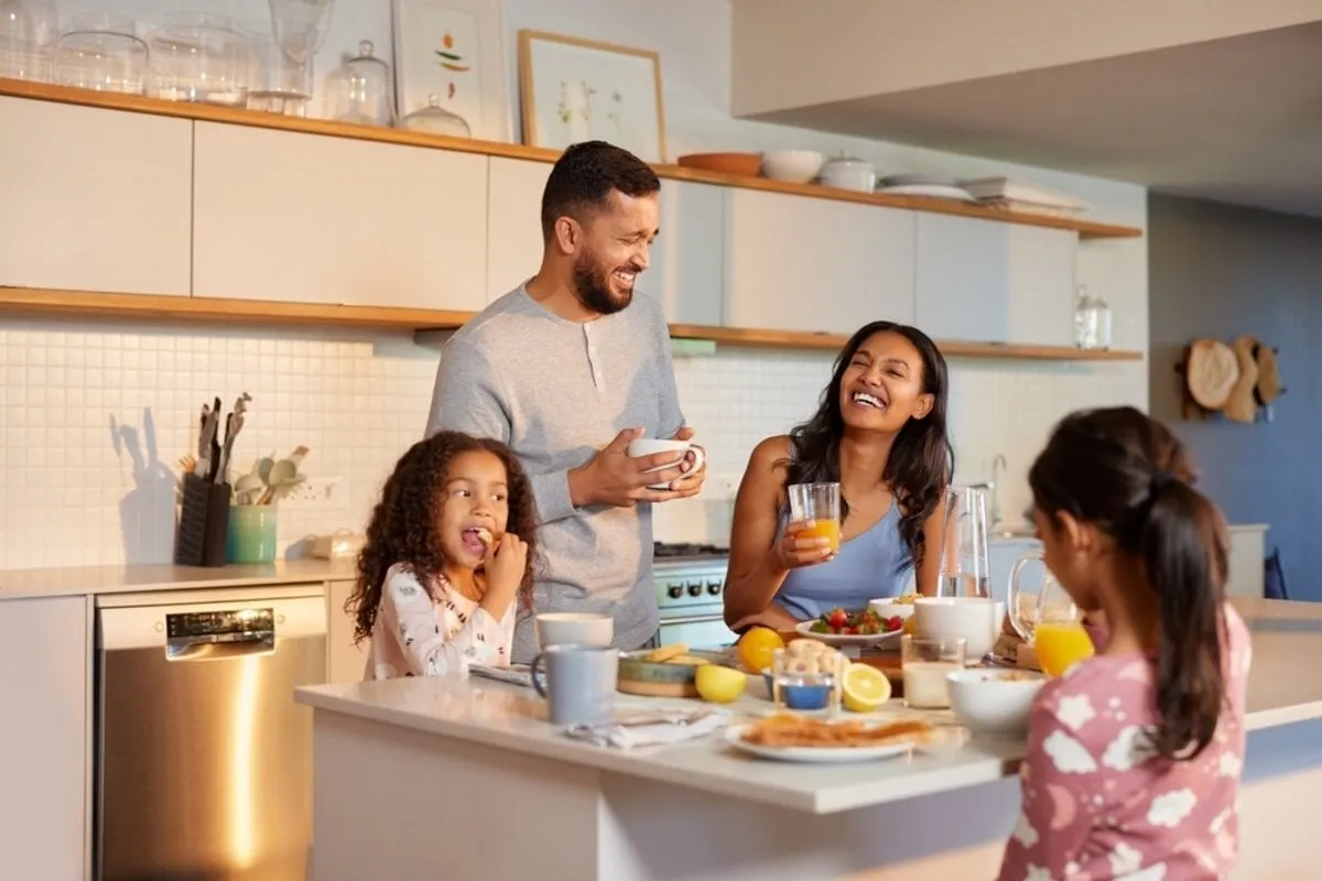 A photo of a family having breakfast | Skylum Blog