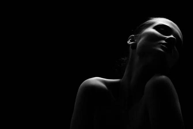 Black and white portrait with dramatic lighting