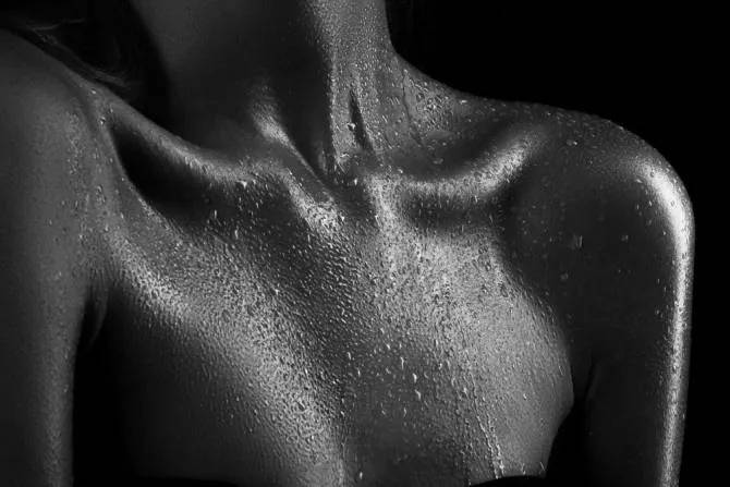 Close-up portrait showing skin texture and light