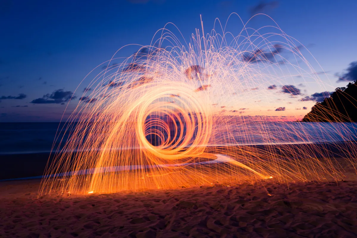 Photo of steel wool on the beach | Skylum Blog