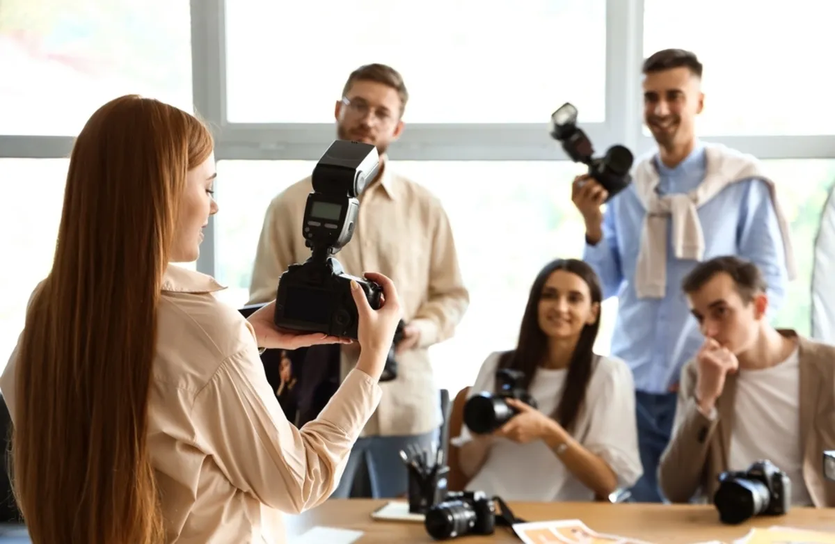 Photographers with cameras on courses | Skylum Blog