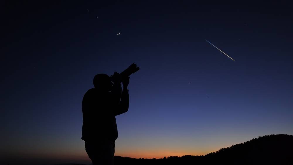 Astrophotographer photographing the evening skies