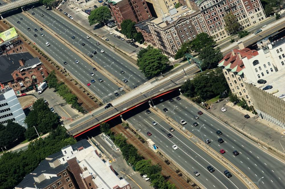 Aerial view of a city highway bridge | Skylum Blog

