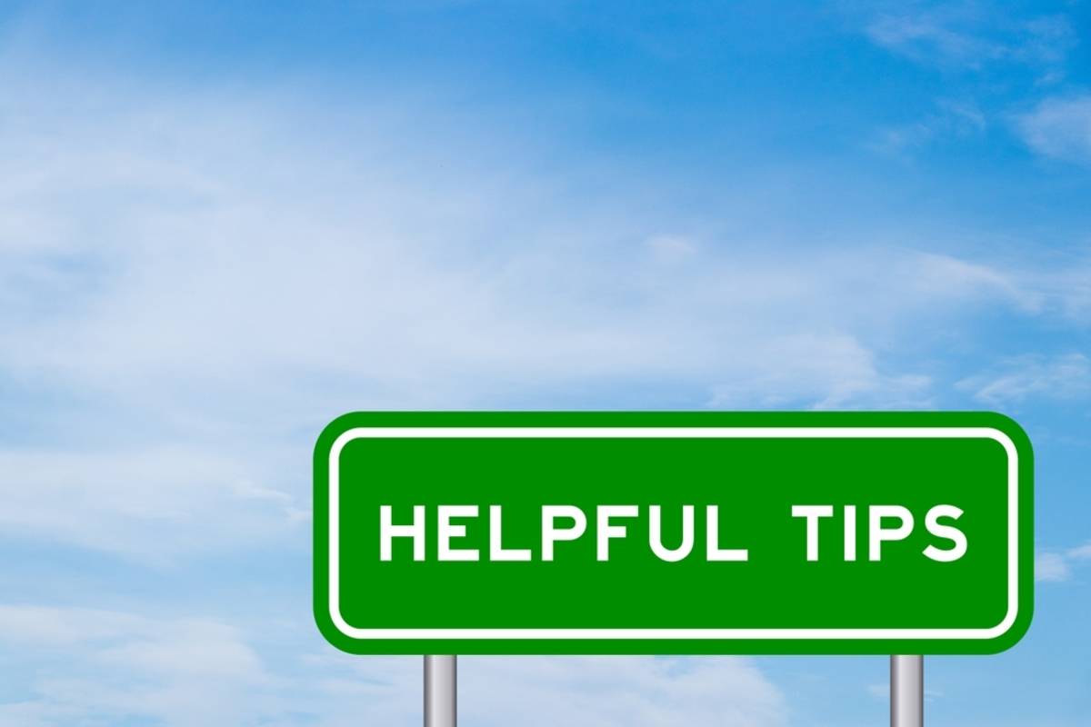 Green Helpful Tips sign under blue sky | Skylum Blog


