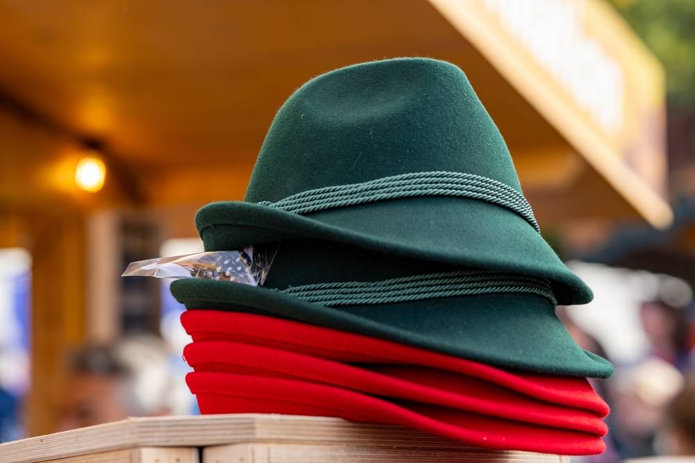 Traditional hats in green and red at the Munich Oktoberfest