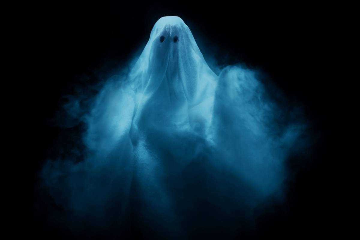 Blue ghostly figure floating in the darkness | Skylum Blog

