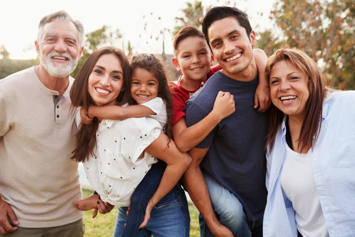 Photo of a family in a park | Skylum Blog