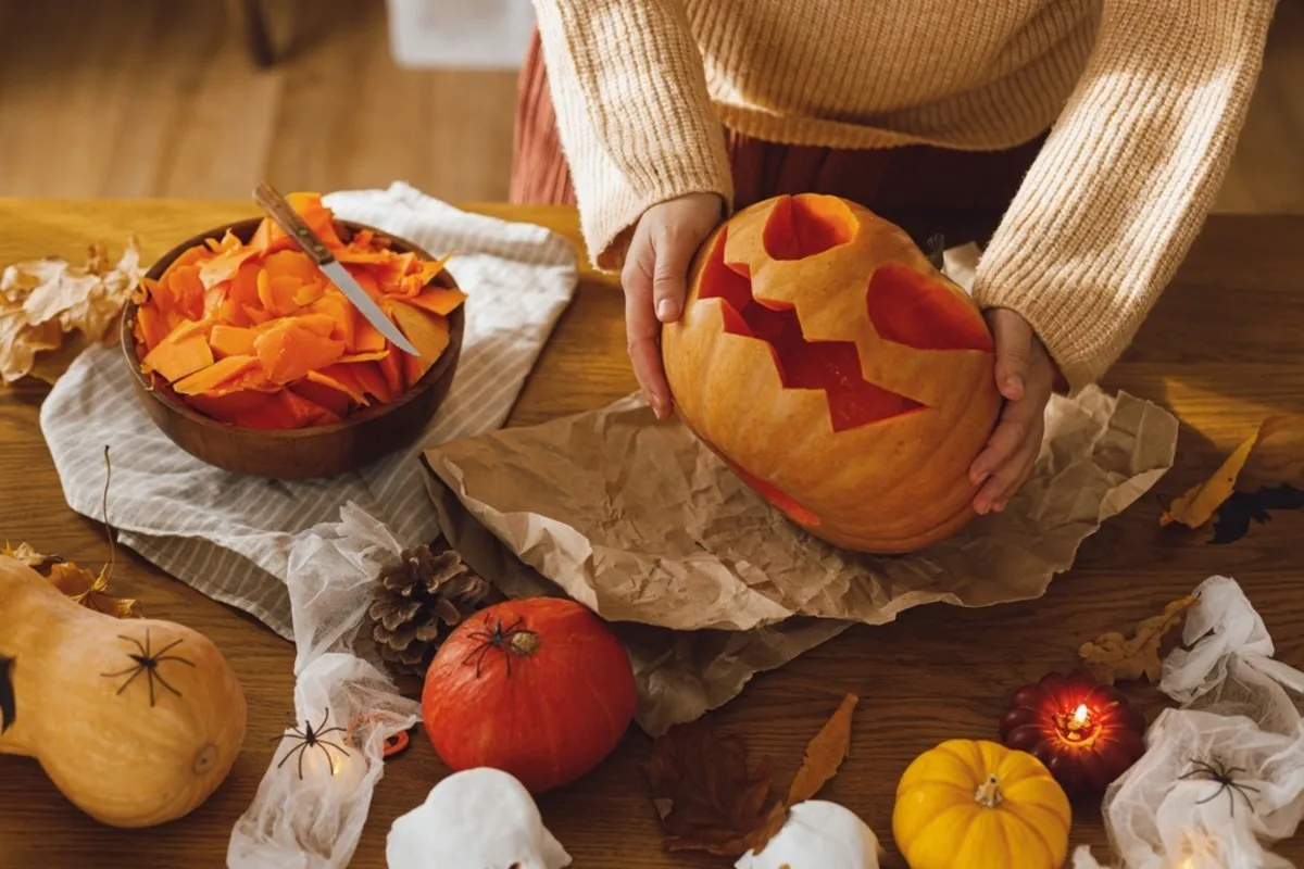 The process of carving a face on a pumpkin for Halloween | Skylum Blog