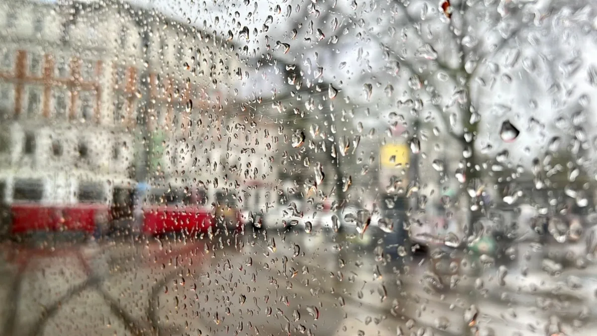 Photo of raindrops on glass | Skylum Blog