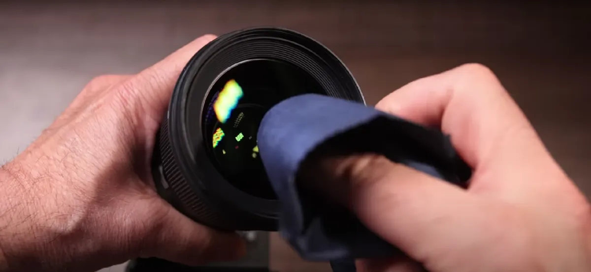Wiping the lens with a tissue | Skylum Blog