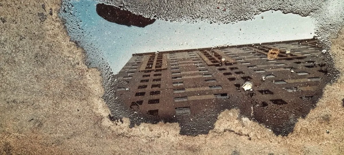 Reflection of a house in a puddle | Skylum Blog