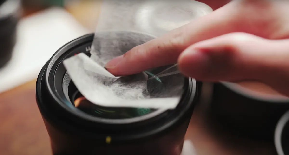 Wiping the lens with a lint-free cloth | Skylum Blog