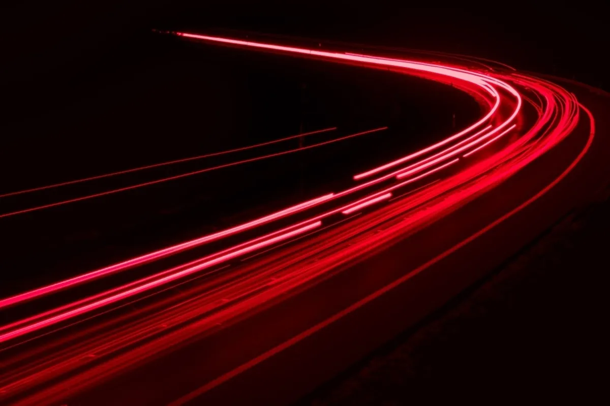 Red lines of light abstraction | Skylum Blog