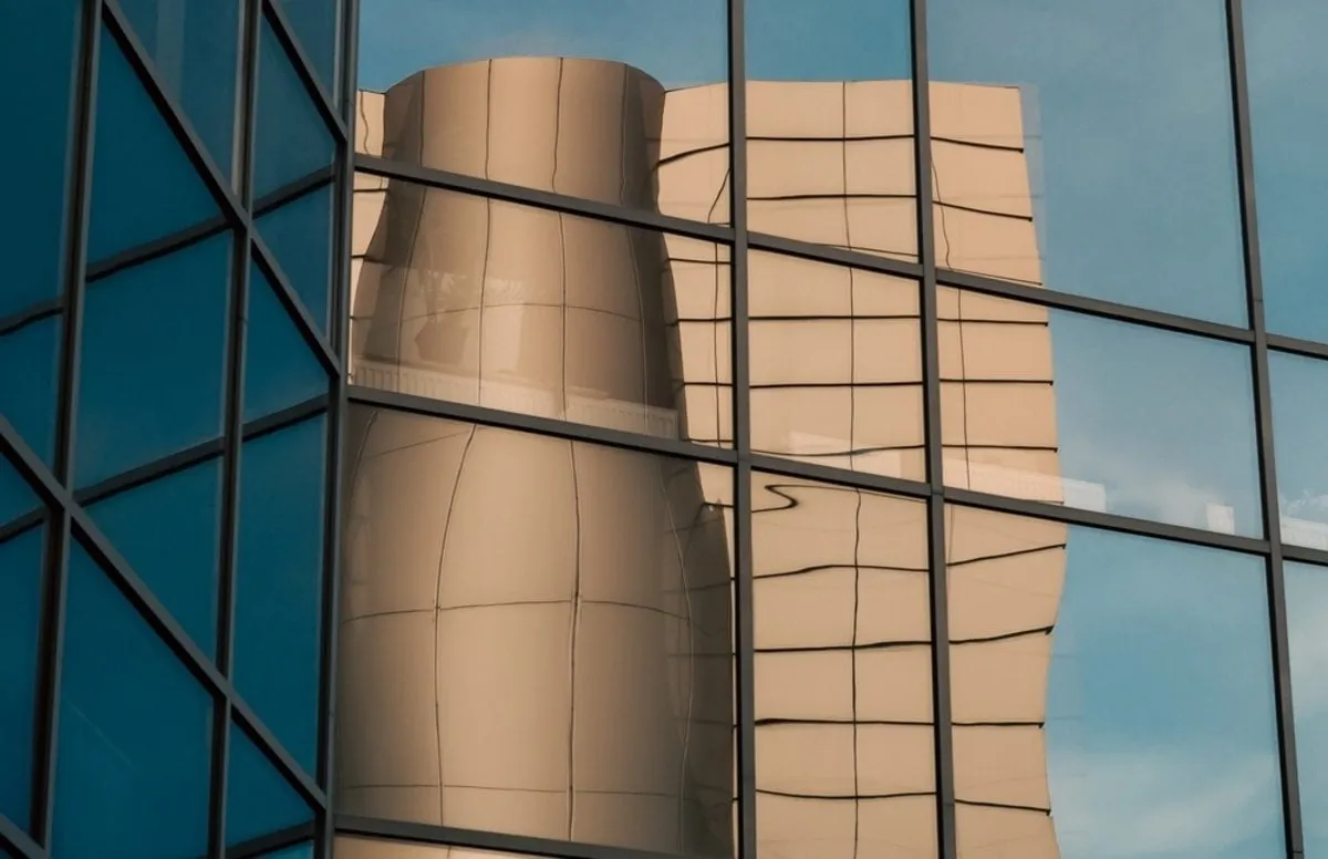 Photo of a mirrored building | Skylum Blog