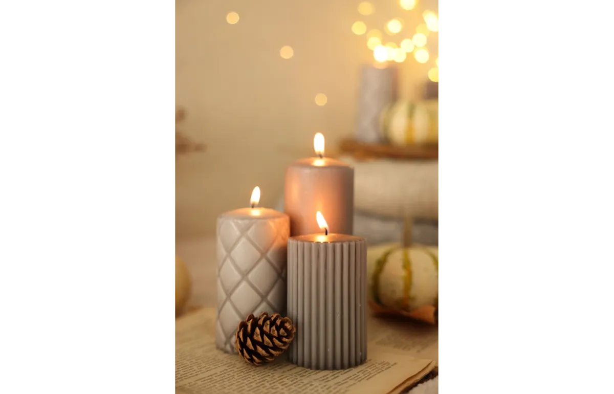 Lit candles with a blurred background | Skylum Blog