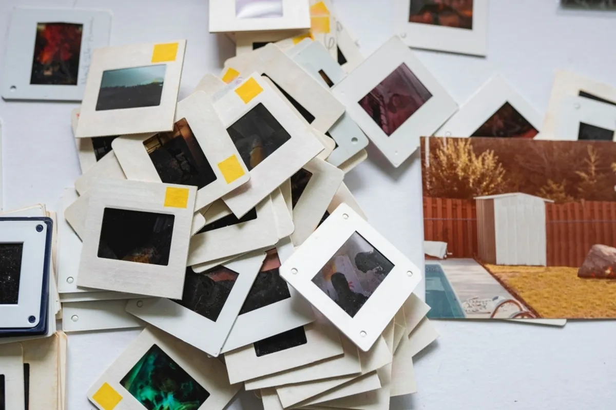 Antique color photographs on the table | Skylum Blog