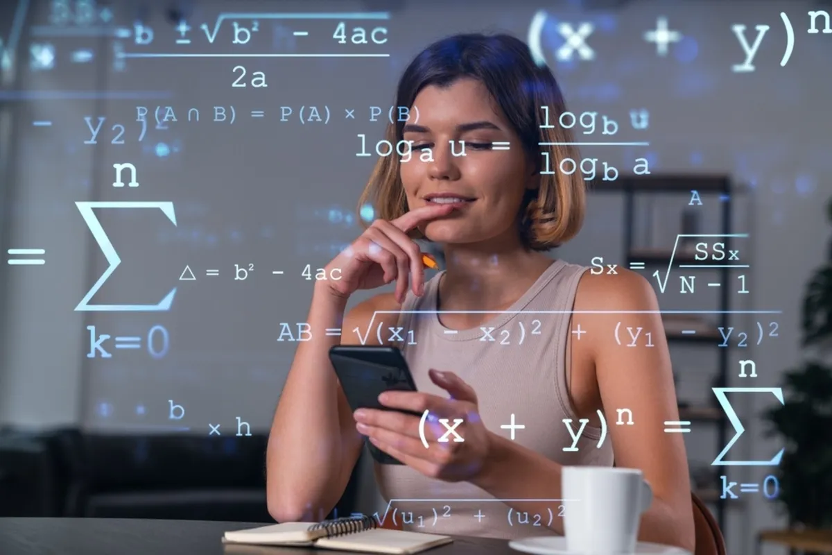 Formulas over a girl with a phone in her hands | Skylum Blog