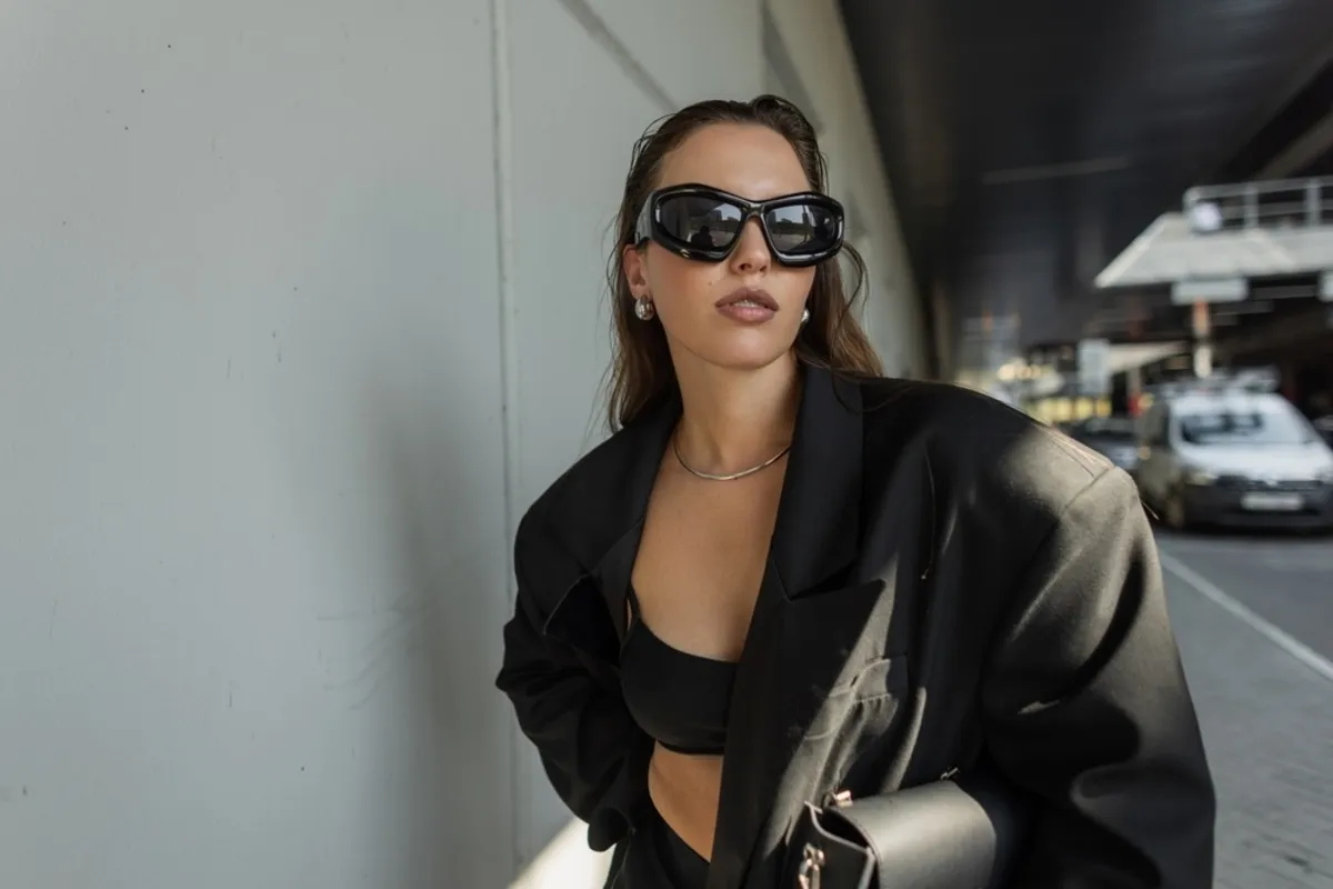 Portrait of a girl wearing glasses on the street | Skylum Blog