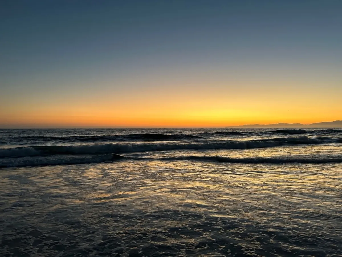 A photo of the ocean during blue hour | Skylum Blog