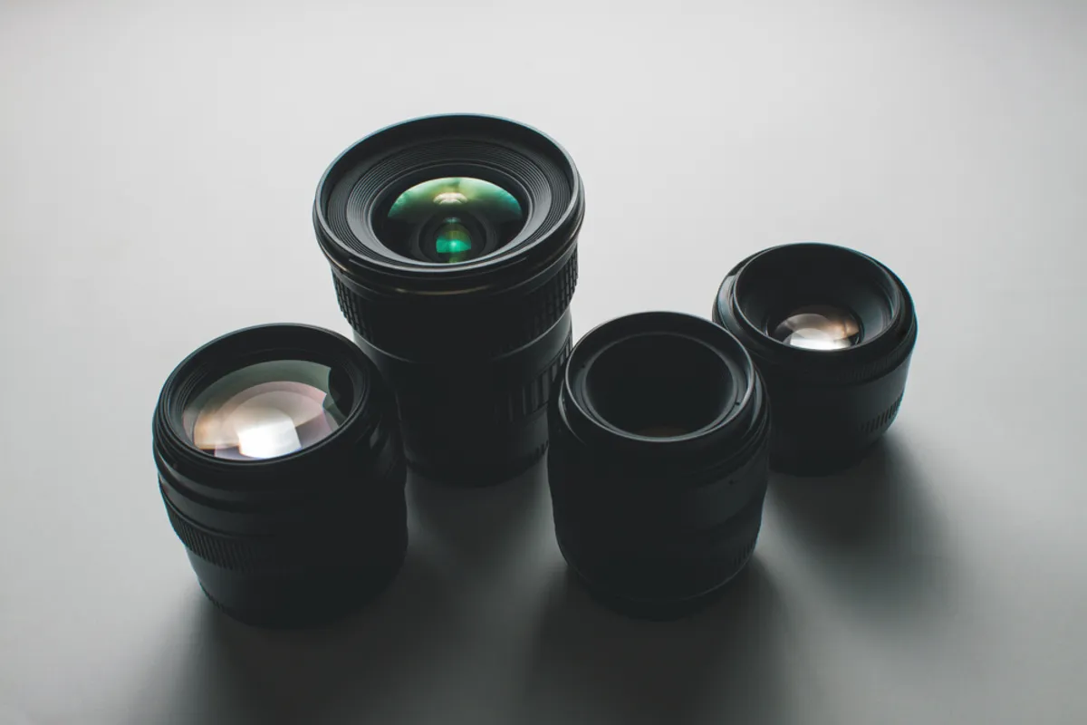Various lenses on the table | Skylum Blog