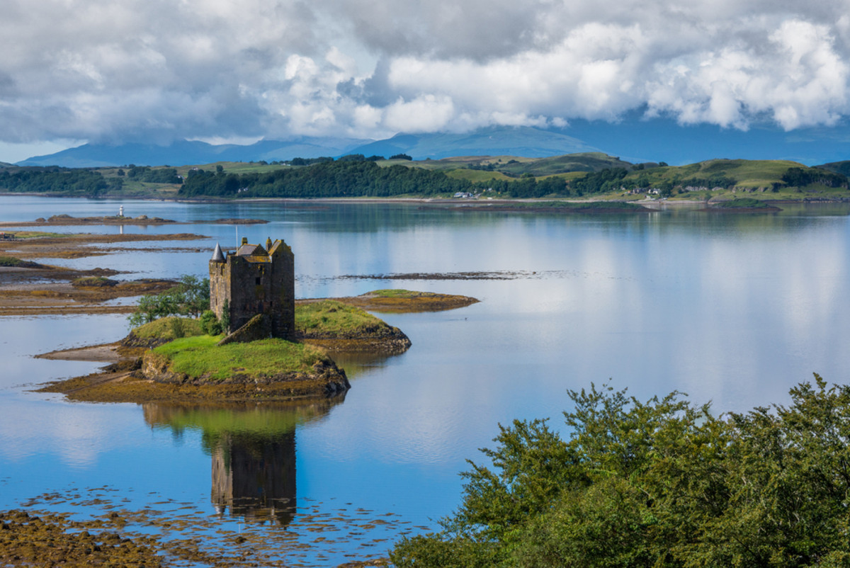 A photo of a castle on a small island using the rule of thirds | Skylum Blog

