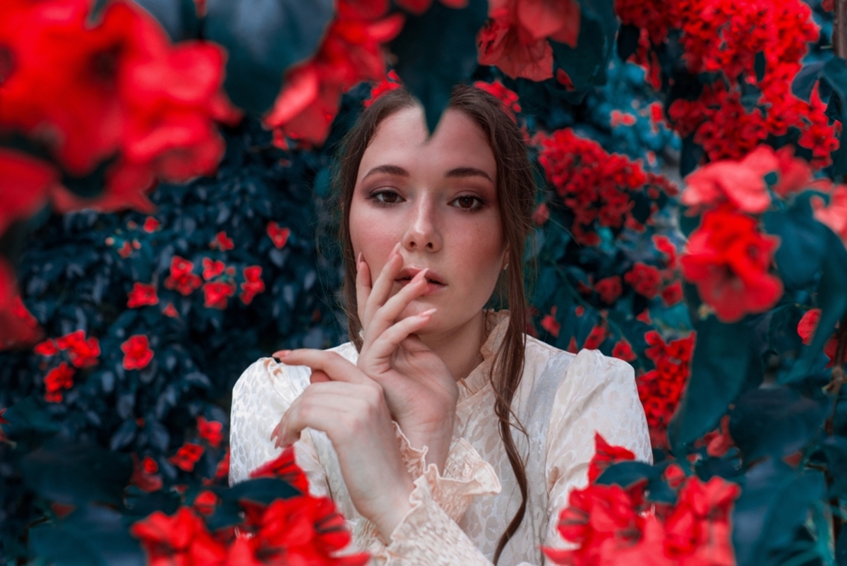 Portrait of a girl in red flowers | Skylum Blog

