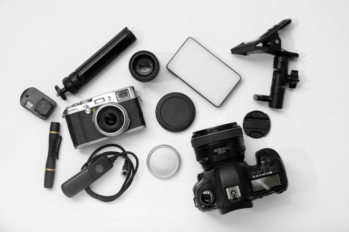Cameras and accessories for them on the table | Skylum Blog

