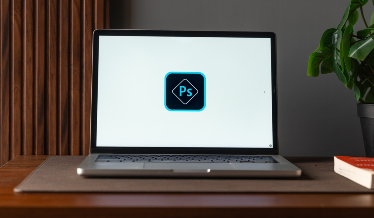 Photoshop icon on a laptop | Skylum Blog

