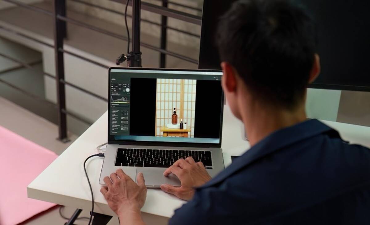 Person editing product photos on a desktop computer | Skylum Blog


