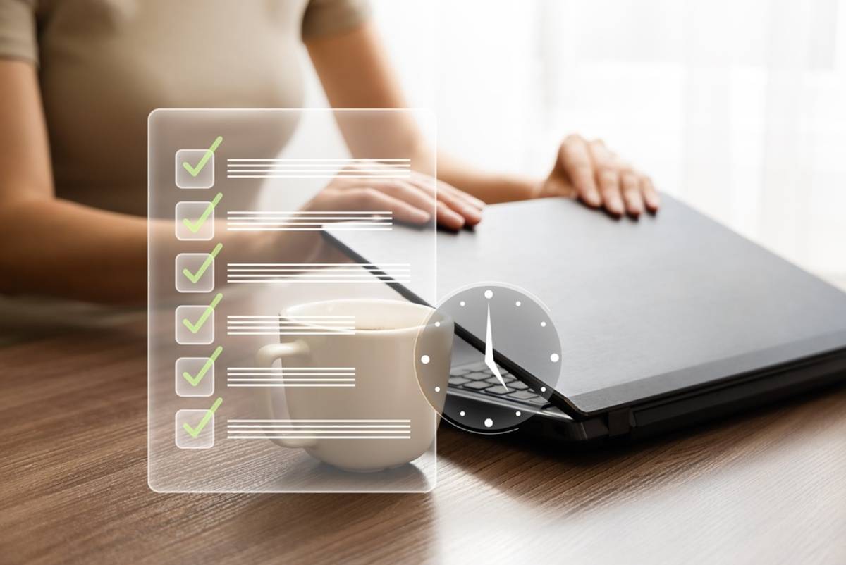 Checklist and clock overlay beside a closed laptop and coffee cup on a desk